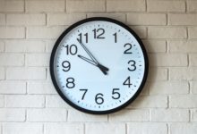 Clock on brick wall